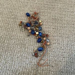 Old necklace with many charms